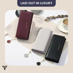 LeisureTime Pendant Wallet, showing all available colors laid out in a luxurious, appealing display - VAYOME.