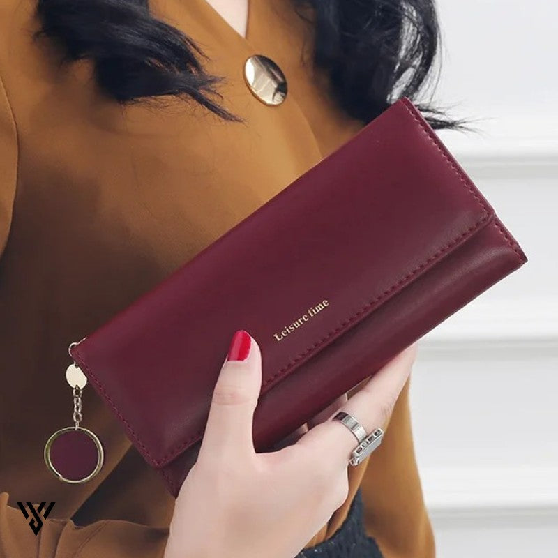 LeisureTime Pendant Wallet, deep red wine color, lifestyle image of a woman holding the stylish, multifunctional wallet - VAYOME.
