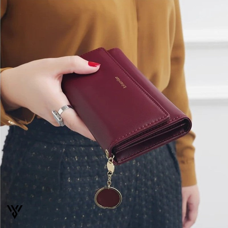 LeisureTime Pendant Wallet, deep red wine color, chic and multifunctional, shown in a stylish lifestyle image - VAYOME.