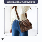 LuxeWax Leather Bucket Bag in black color, a women's fashion luxury handbag/shoulder bag, described as waxed, vibrant, and luxurious - VAYOME