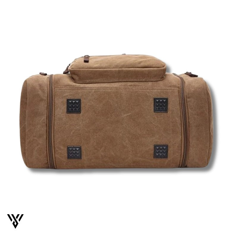 NomadVault Canvas Duffel Bag, men's outdoor travel bag in brown, durable bottom side view - VAYOME.