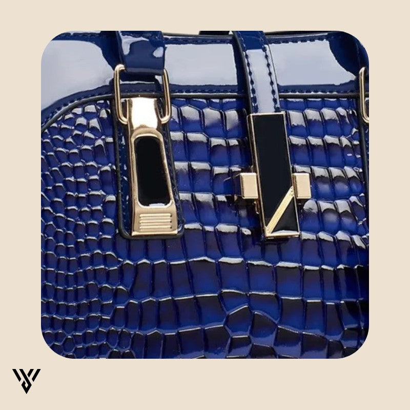 Velmira Luxe Tote in navy blue, zoomed view of the elegant handle and high-quality leather texture - VAYOME.