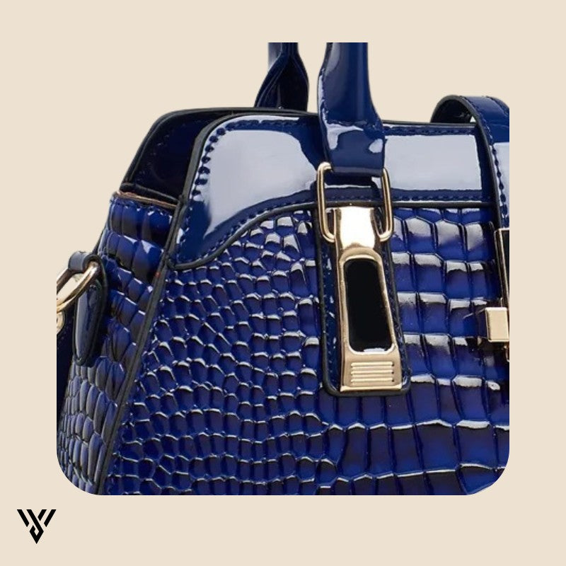 Velmira Luxe Tote in navy blue, zoomed view of the elegant top corner and fine construction details - VAYOME.